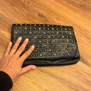 Bcbg black clutch with studs